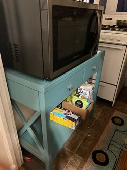 Microwave and little wooden shelf $20