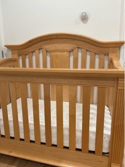 Hardwood crib convertible to children’s bed