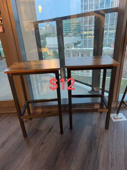 Two wooden bar stools