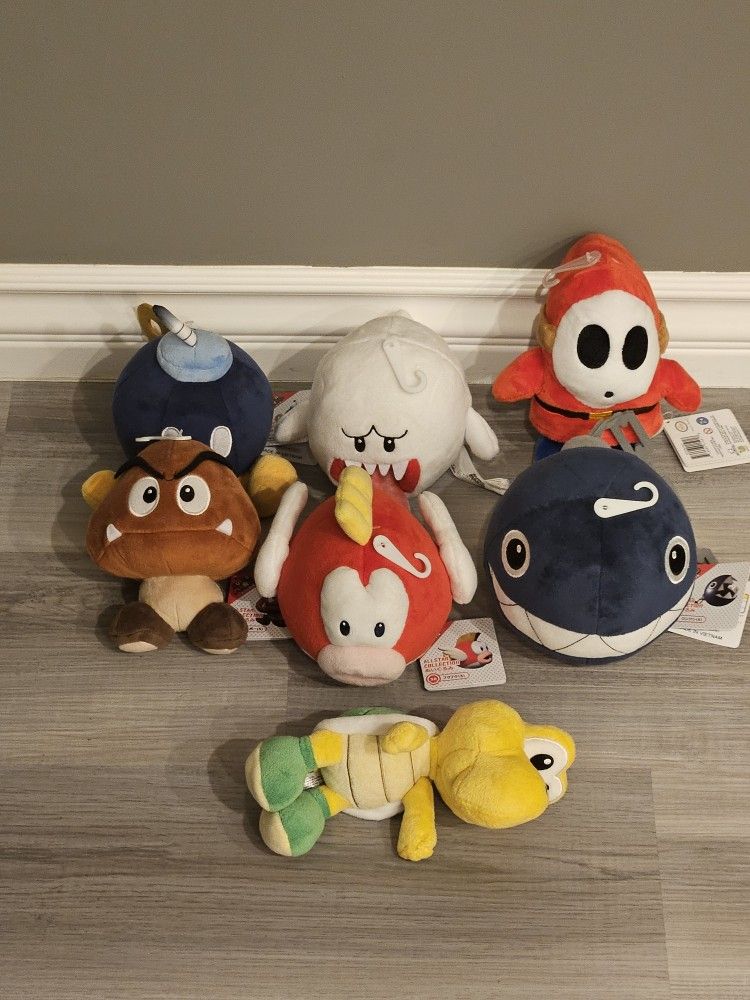 collection of mario enemy plushies