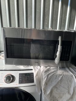 Brand new Samsung microwave with vent