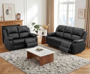 Black leather fully reclining couch and love seat