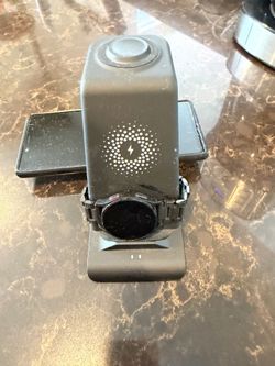 Phone smart watch and a charger stand