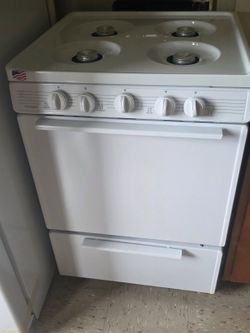 Brand New refrigerator and a stove
