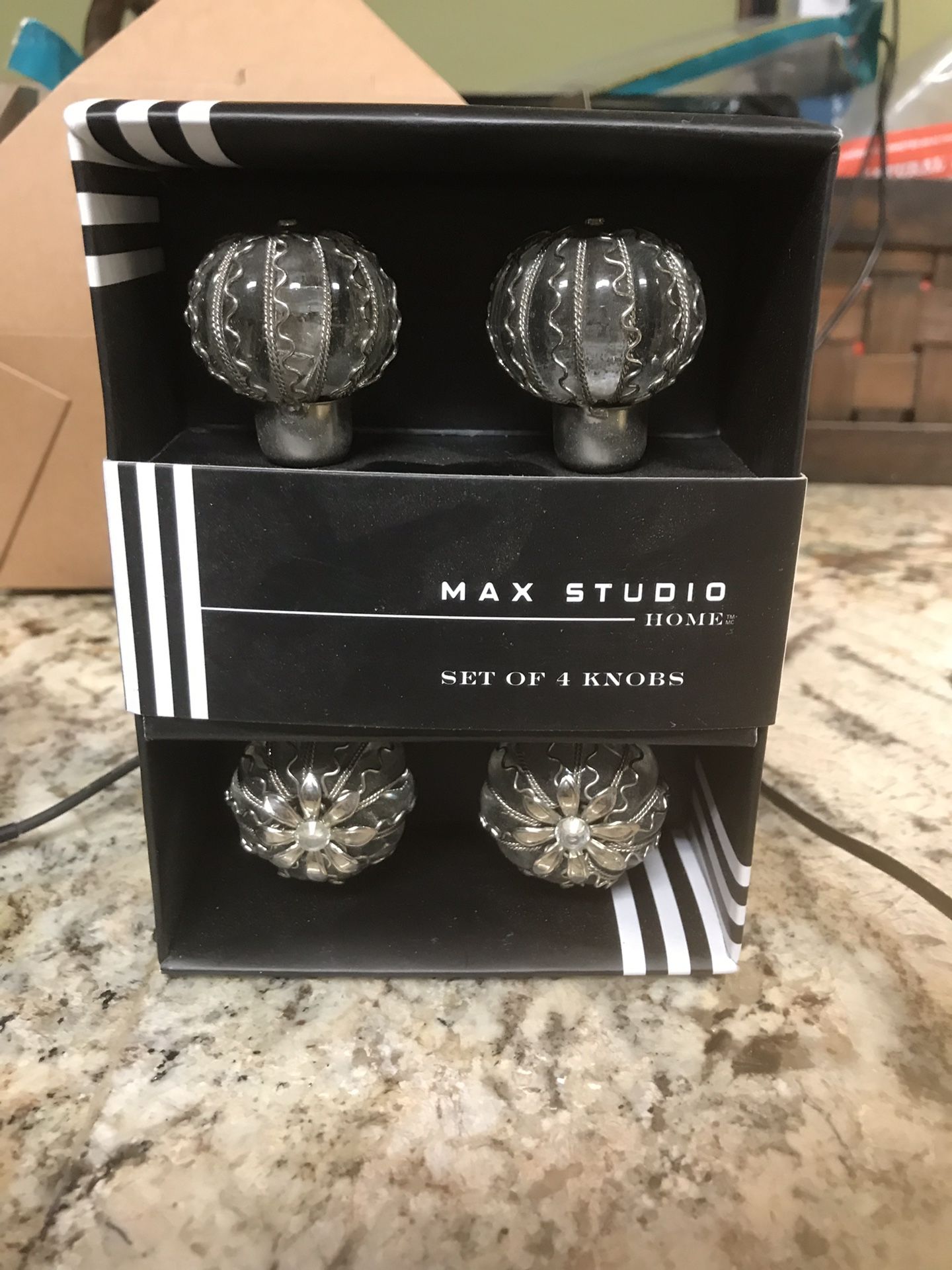2 brand new boxes of dresser knobs
