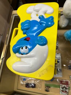 Collectible Smurfs case with Smurfs