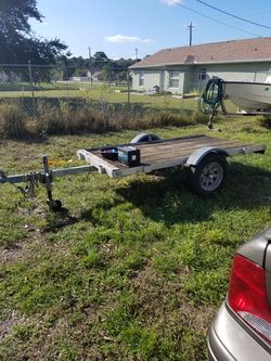 4x8 galvanized utility trailer, with wood decking.