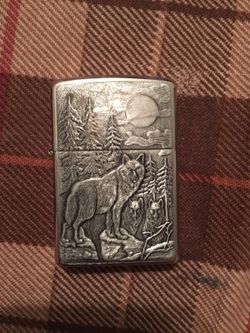 Beautiful zippo lighter with forest and wolves scene