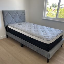 Twin size bed frame with mattress