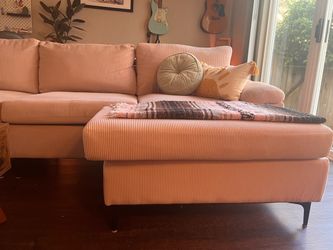 Pink Corduroy Apartment Couch; reversible chaise