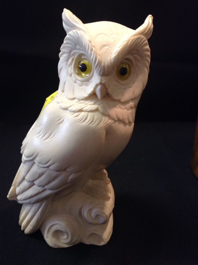 Carved owl figure