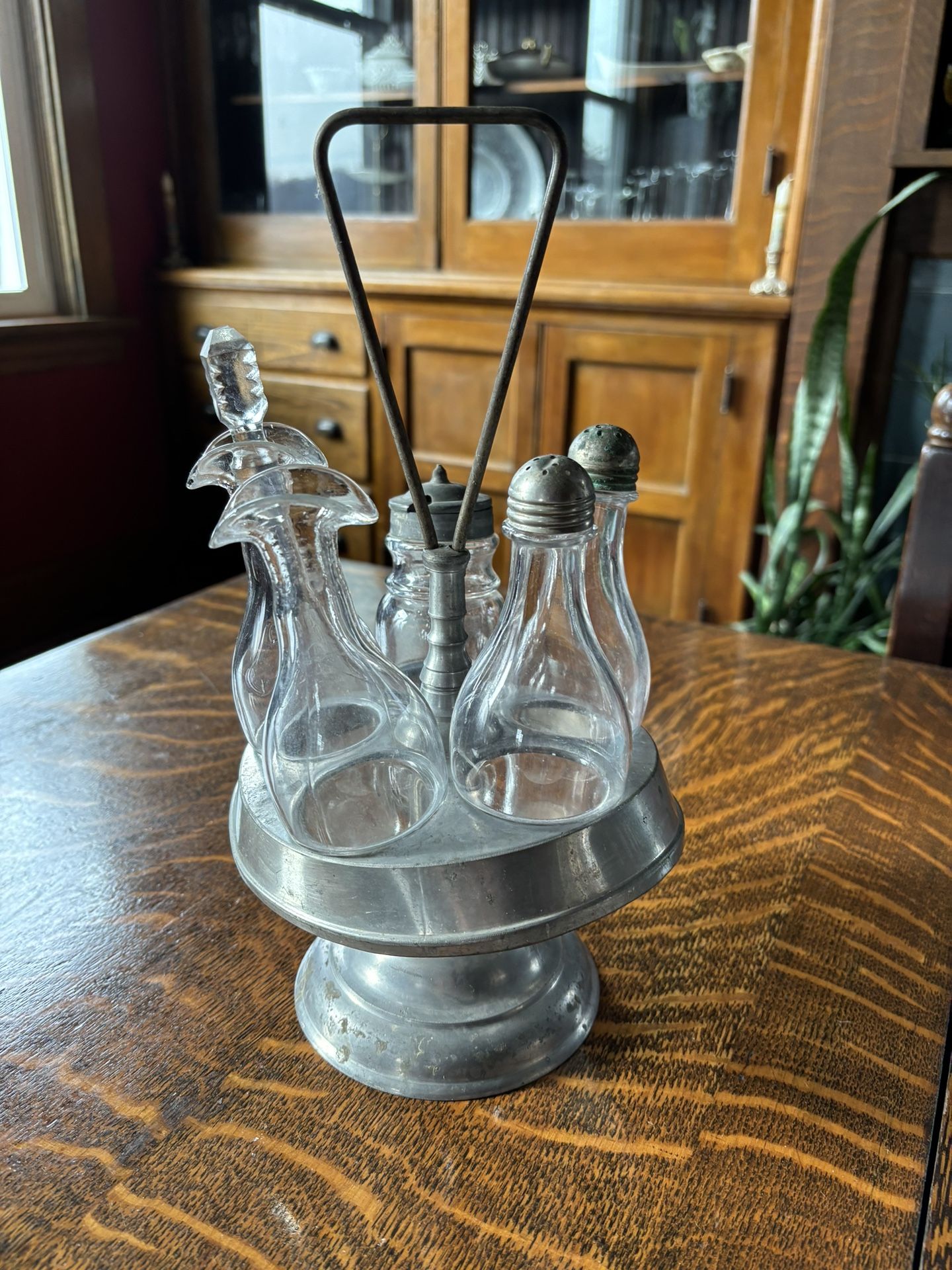5 piece rotating antique cruet set