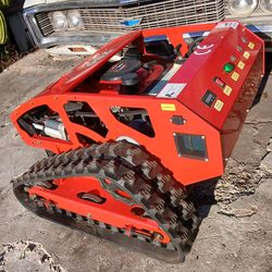 REMOTE CONTROLLED LAWN MOWER!! LIKE NEW!! 1150$