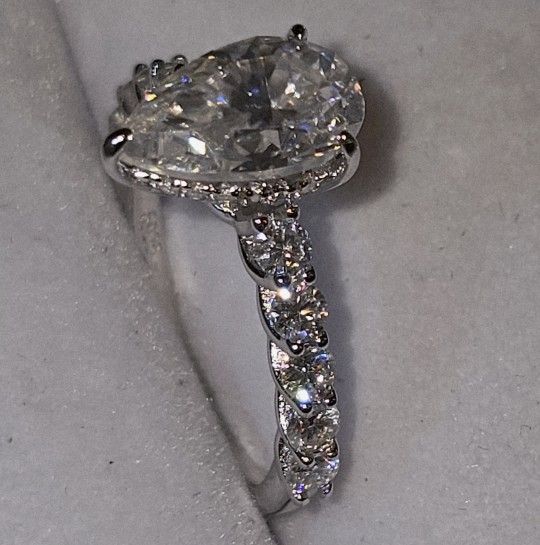 2cwt Pear Shape Moissanite With Half Eternity Band