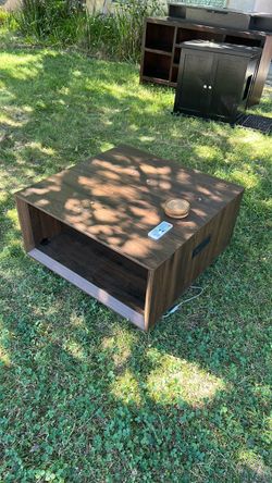 Coffee table with LED light strip on the bottom