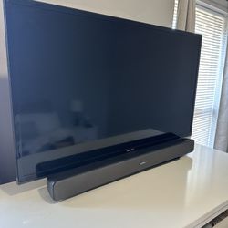 LCD TV With Soundbar And Wall Mount