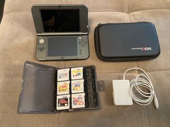 Nintendo 3DS XL with 6 games