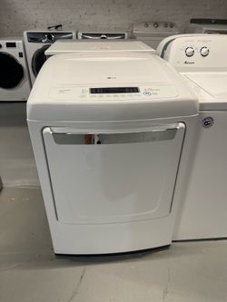 LG electric dryer with a 90-day warranty on the receipt.