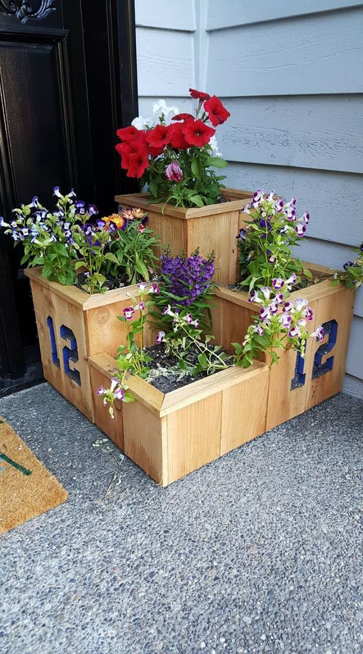 3 tiered cedar planter box. Approx. 22"x22" base w/ boxes measuring 18",12", 7 inches.