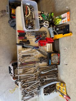 Assorted wrench’s and tools and saw blades