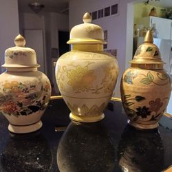  3 really, NEAT LOOKING  VASES  Or URN  7 TO 8,5 INCHES TALL  PERFECT CONDITION 