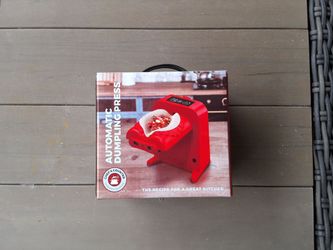 Automatic dumpling press