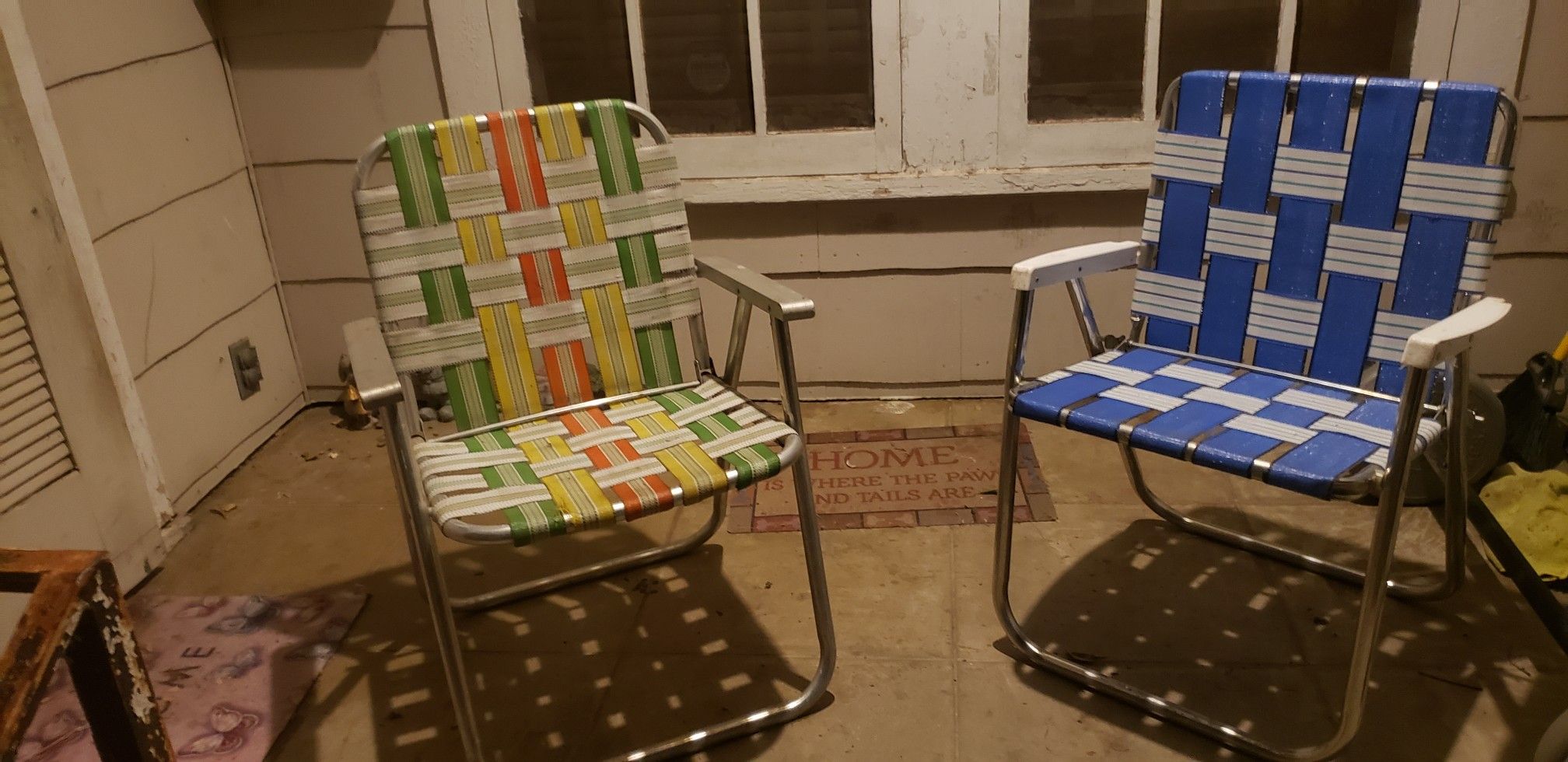 Two vintage aluminum lawn chairs