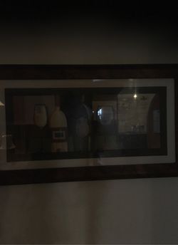 Rectangle picture featuring wine bottles and glasses