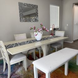 Light wood dinning table set with 4 chairs and bench