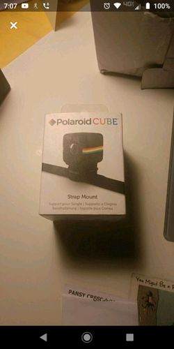 If you have the small Polaroid camera use a strap Mount put it on your head