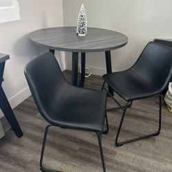 Round dining set with 4 chairs and side table