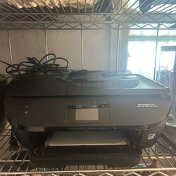 HP OfficeJet all in one printer 5745 it scans copies, prints, faxes, and web