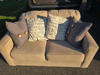 Loveseat with decorative cushions