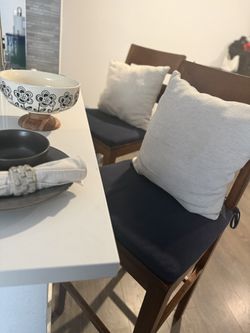 SOLID WOOD BAR STOOL SET (2) DARK BROWN W/ NAVY BLUE SEAT CUSHIONS &’ CREAM PILLOWS FOR COMFORTABILITY!! 
