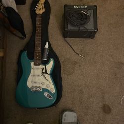 Electric guitar with amp
