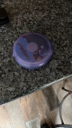 Compact Disc CD in Purple Plastic Case