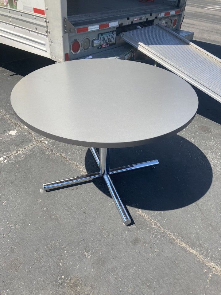 Circular Grey Table with Metal Base