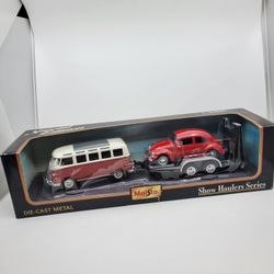 Maisto Road & Track Die Cast Red Volkswagen Van Samba with VW Beetle 
New sealed. Show Haulers series. Van 1:25, Beetle 1:24.
UPC 08. Produc