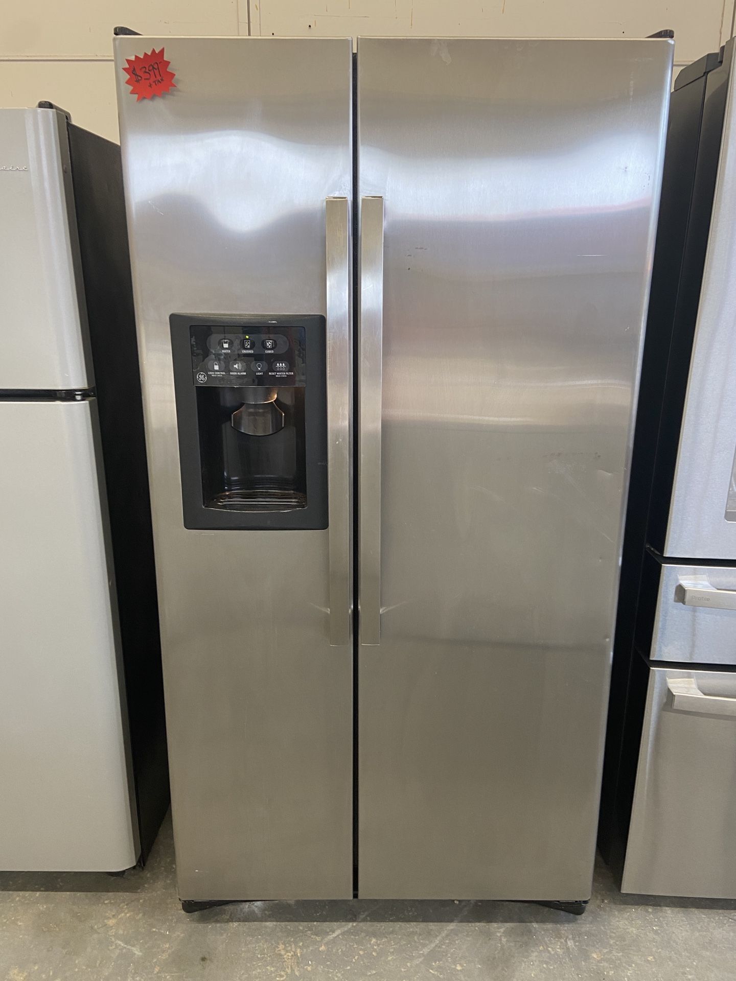 GE STAINLESS STEEL SIDE BY SIDE REFRIGERATOR