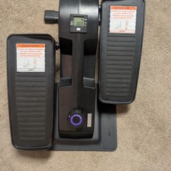 Cubii Work+Out compact under desk elliptical. 
Model F3A2.

