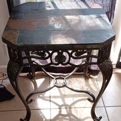 2 Heavy duty iron framed and stone tiled top end tables that measures about 26" x 26" x 27.5" H.