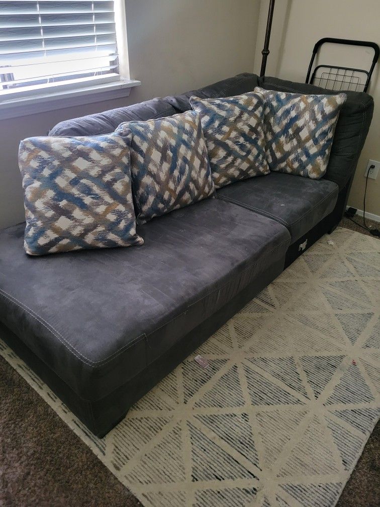 Small Couch With Pillows And Rug