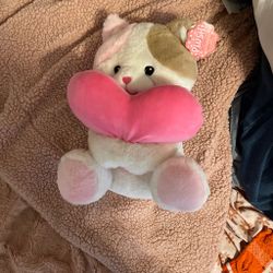 Cat plush with heart