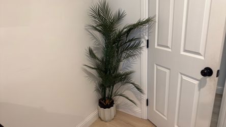 Artificial plant with vase