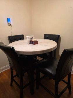 Counter height white marble table
