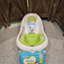 baby bath with diaps and nose cleaner
