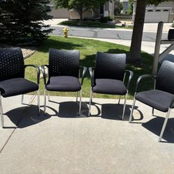 4 Black And Silver Chairs