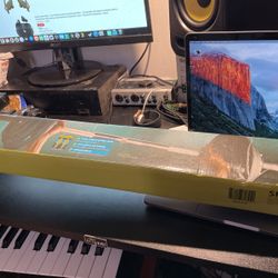 Weight Lifting Bar ( Comes With 2 35 Pound Plates)