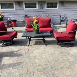 Outdoor Love Seat, Coffee Table,  W/Rocking Swivel Chairs 