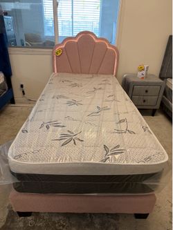 Twin size bed frame with pillow top mattress included